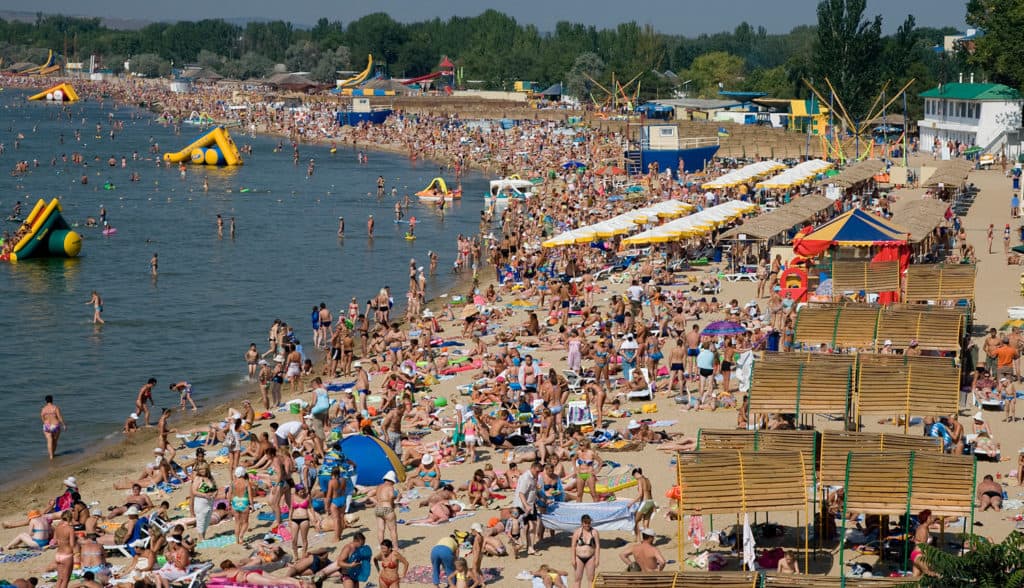 To Avoid The Covid's Curfews, Russians Resort To Foreign Beaches